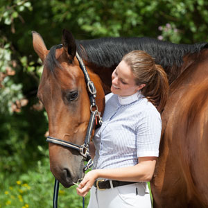 caring horse owner image